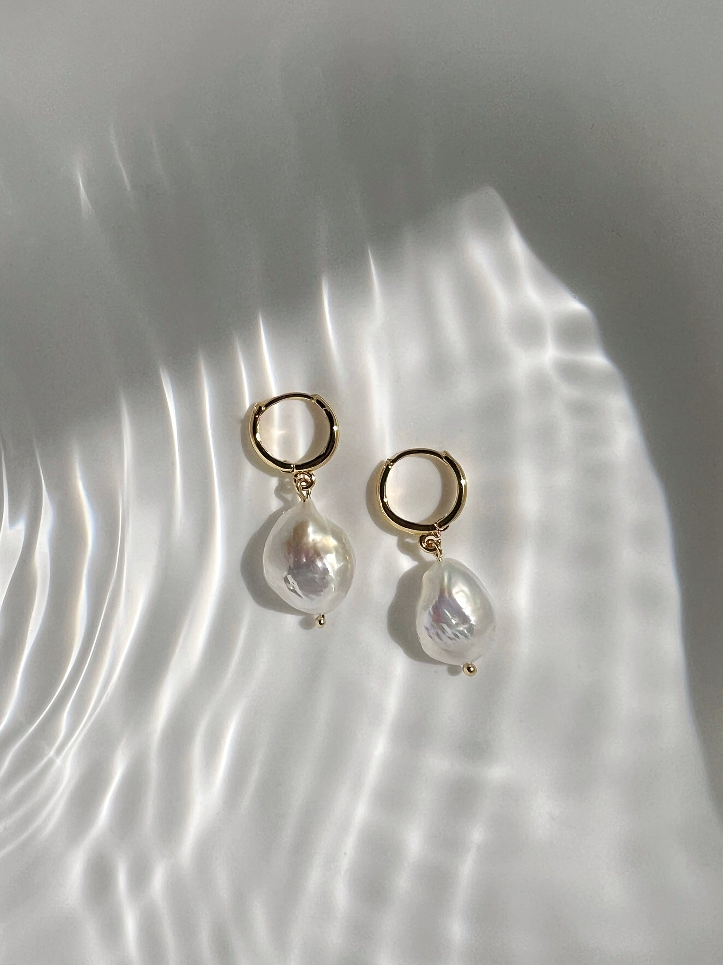 Big pearl earrings