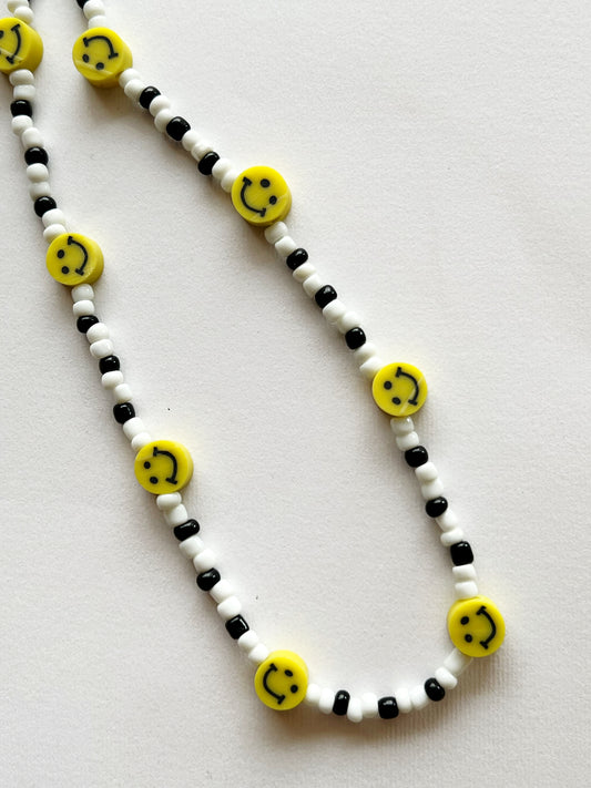 The smiley face phone strap